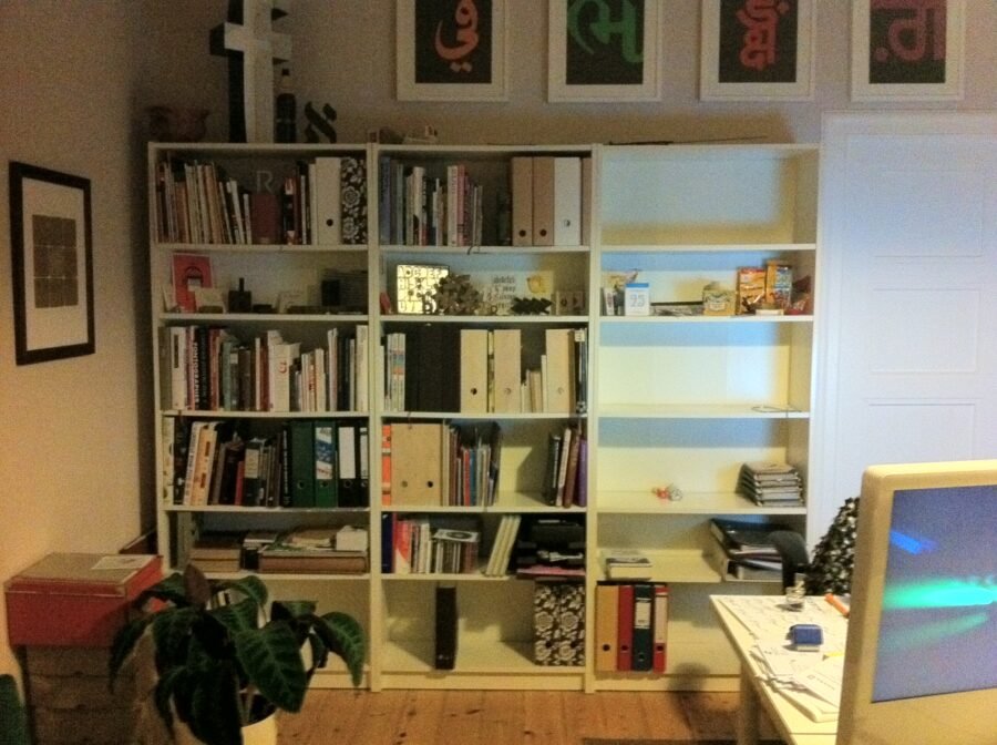 The bookshelves are slowly getting packed up